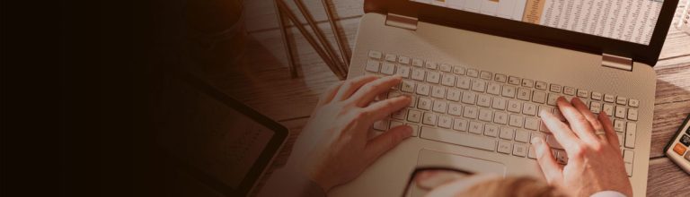 laptop and speadsheet 1170x335 1